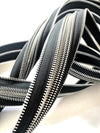 CONVOLUTION REVOLUTION - ZIPPER SCULPTURE